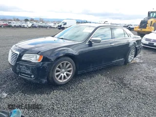 2012 Chrysler 300 Limited with VIN 2C3CCACG0CH263449, listed as a IAAI auction lot 41829134 with 157,108 mi miles. Bid and sale history available at carsss.com. Image 2.