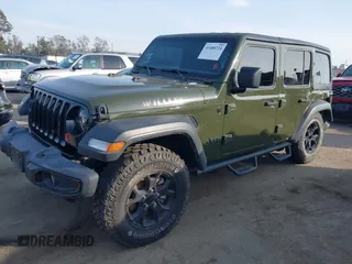 2022 Jeep Wrangler Unlimited High Tide with VIN 1C4HJXDG5NW113205, listed as a IAAI auction lot 41488724 with 30,446 mi miles and . Bid and sale history available at DreamBid. Image 18.