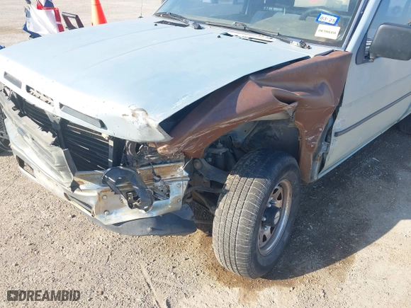 1990 Nissan Trucks 2WD XE with VIN 1N6SD11S4LC400985, listed as a IAAI auction lot 41986390 with 189,924 mi miles. Bid and sale history available at carsss.com. Image 6.