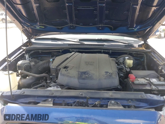 2015 Toyota Tacoma with VIN 3TMLU4EN1FM187705, listed as a IAAI auction lot 42119222 with 115,471 mi miles and . Bid and sale history available at DreamBid. Image 10.