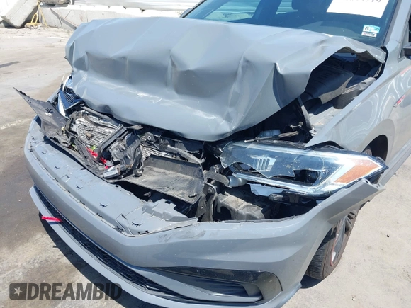2019 Volkswagen Jetta GLI S z VIN 3VW6T7BU9KM153175, wystawiony jako IAAI lot #42099719 z przebiegiem 90 608 mil mil oraz . Historia ofert i sprzedaży dostępna na DreamBid. Obrazek 6.