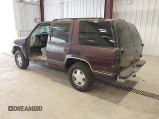 1996 Chevrolet Tahoe z VIN 1GNEK13R3TJ387858, wystawiony jako IAAI lot #41675147 z przebiegiem 196 811 mil mil oraz . Historia ofert i sprzedaży dostępna na DreamBid. Obrazek 3.