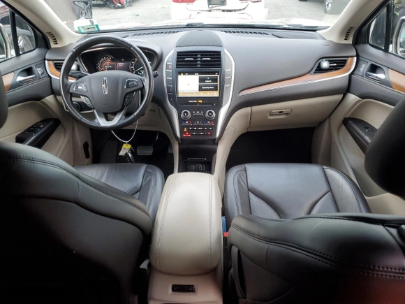 2018 Lincoln MKC Select with VIN 5LMCJ2D99JUL21181, listed as a Copart auction lot 82827134 with 63,667 mi miles and Salvage title. Bid and sale history available at DreamBid. Image 8.