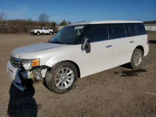 2009 Ford Flex SEL with VIN 2FMDK52C79BA01587, listed as a Copart auction lot 50880195 with 128,573 mi miles and Salvage Title. Bid and sale history available at carsss.com. Image 1.