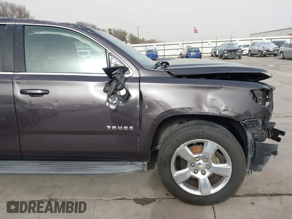 2015 Chevrolet Tahoe LT with VIN 1GNSCBKC5FR504459, listed as a IAAI auction lot 41689405 with 141,783 mi miles and . Bid and sale history available at DreamBid. Image 14.