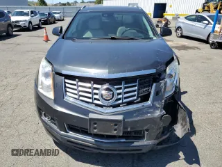 2014 Cadillac SRX Performance Collection z VIN 3GYFNCE36ES687267, wystawiony jako Copart lot #58242255 z przebiegiem 167 577 mil mil oraz Szkoda całkowita • Salvage title. Historia ofert i sprzedaży dostępna na DreamBid. Obrazek 5.