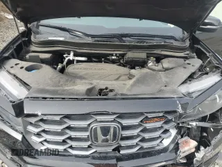 2023 Honda Passport TrailSport with VIN 5FNYF8H63PB010963, listed as a Copart auction lot 43573485 with 18,610 mi miles and Salvage title. Bid and sale history available at DreamBid. Image 12.