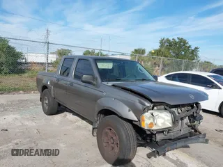 2004 Nissan Frontier XE z VIN 1N6ED27T84C446582, wystawiony jako IAAI lot #41428931 z przebiegiem Nie podano mil oraz . Historia ofert i sprzedaży dostępna na DreamBid. Obrazek 1.