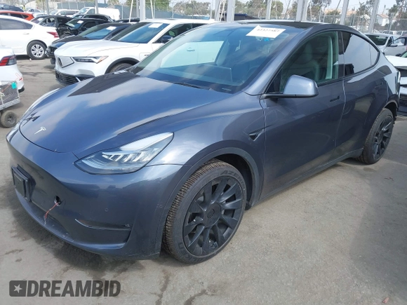 2022 Tesla Model Y Long Range z VIN 7SAYGDEE6NF364994, wystawiony jako IAAI lot #42322587 z przebiegiem 41 572 mil mil oraz . Historia ofert i sprzedaży dostępna na DreamBid. Obrazek 2.