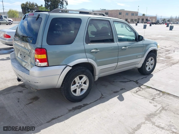 2007 Ford Escape Hybrid with VIN 1FMCU59H37KA92464, listed as a IAAI auction lot 42001479 with 159,147 mi miles. Bid and sale history available at carsss.com. Image 4.