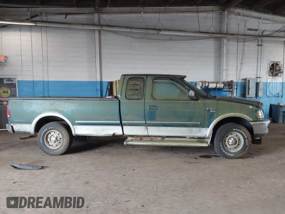 1998 Ford F-150 z VIN 1FTZX18W0WNB10429, wystawiony jako IAAI lot #42501385 z przebiegiem 175 318 mil mil oraz . Historia ofert i sprzedaży dostępna na DreamBid. Obrazek 13.