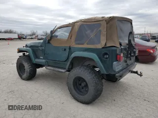 2000 Jeep Wrangler Sahara z VIN 1J4FA59S5YP803327, wystawiony jako Copart lot #44382505 z przebiegiem Nie podano mil oraz Szkoda całkowita • Salvage title. Historia ofert i sprzedaży dostępna na DreamBid. Obrazek 2.
