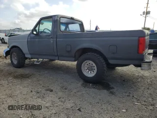 1992 Ford F-150 with VIN 1FTDF15Y4NLA94328, listed as a Copart auction lot 51690965 with 191,656 mi miles and Salvage Title. Bid and sale history available at carsss.com. Image 2.