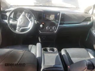 2016 Toyota Sienna SE with VIN 5TDXK3DC7GS696720, listed as a Copart auction lot 59052915 with 86,919 mi miles and Salvage title. Bid and sale history available at DreamBid. Image 8.