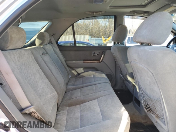 2005 Kia Sorento LX with VIN KNDJD733355371302, listed as a Copart auction lot 86979004 with 140,905 mi miles and Salvage Title. Bid and sale history available at carsss.com. Image 11.