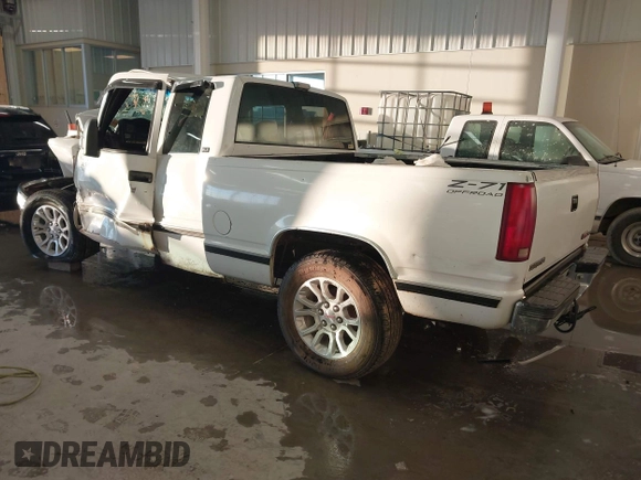 1993 GMC Sierra 1500 z VIN 2GTEK19K1P1564491, wystawiony jako IAAI lot #41347909 z przebiegiem 342 325 mil mil oraz . Historia ofert i sprzedaży dostępna na DreamBid. Obrazek 3.