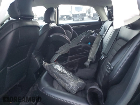 2017 Ford Fusion SE z VIN 3FA6P0HD1HR312200, wystawiony jako Copart lot #82823184 z przebiegiem Nie podano mil oraz Szkoda całkowita • Salvage title. Historia ofert i sprzedaży dostępna na DreamBid. Obrazek 10.