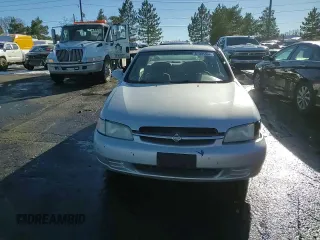 1999 Nissan Altima XE with VIN 1N4DL01D3XC204946, listed as a Copart auction lot 87009404 with 184,731 mi miles and Non Repairable. Bid and sale history available at carsss.com. Image 10.