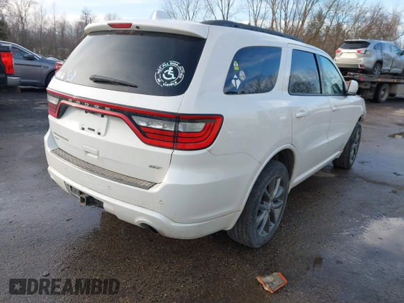 2017 Dodge Durango GT with VIN 1C4RDJDGXHC907163, listed as a IAAI auction lot 41427766 with 119,719 mi miles and . Bid and sale history available at carsss.com. Image 4.