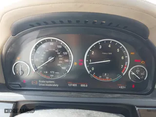 2010 BMW 7 Series 750Li with VIN WBAKB8C54ACY63650, listed as a IAAI auction lot 41961941 with 127,405 mi miles. Bid and sale history available at carsss.com. Image 7.
