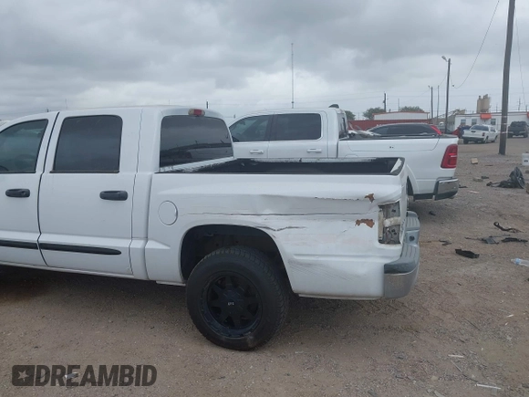 2006 Dodge Dakota SLT with VIN 1D7HE48K56S532946, listed as a IAAI auction lot 41878467 with 106,218 mi miles. Bid and sale history available at carsss.com. Image 6.