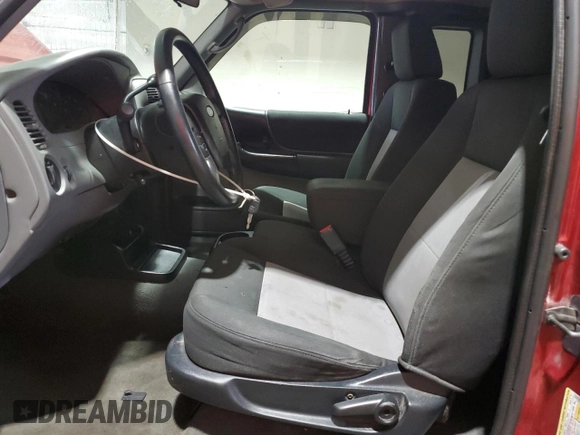 2010 Ford Ranger XLT with VIN 1FTLR4FE1APA70550, listed as a Copart auction lot 56716325 with 77,529 mi miles and Salvage title. Bid and sale history available at DreamBid. Image 7.