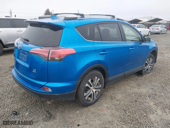 2018 Toyota RAV4 LE with VIN JTMBFREVXJJ739954, listed as a IAAI auction lot 41739873 with 13,726 mi miles. Bid and sale history available at carsss.com. Image 4.