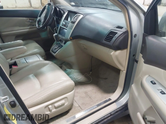 2006 Lexus RX 400h with VIN JTJHW31U760025259, listed as a IAAI auction lot 42743434 with 207,558 mi miles and . Bid and sale history available at DreamBid. Image 5.