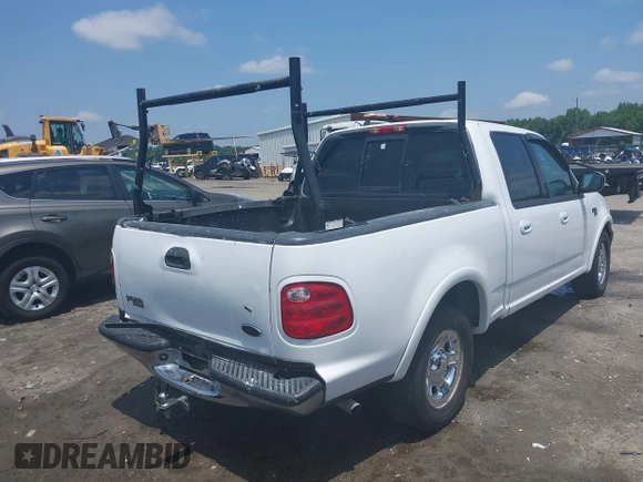 2001 Ford F-150 XLT with VIN 1FTRW07L91KB77612, listed as a IAAI auction lot 42432387 with 106,574 mi miles and . Bid and sale history available at DreamBid. Image 4.