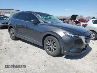 2021 Mazda CX-9 Touring z VIN JM3TCACY5M0500924, wystawiony jako Copart lot #50654505 z przebiegiem 57 067 mil mil oraz Szkoda całkowita • Salvage title. Historia ofert i sprzedaży dostępna na DreamBid. Obrazek 4.