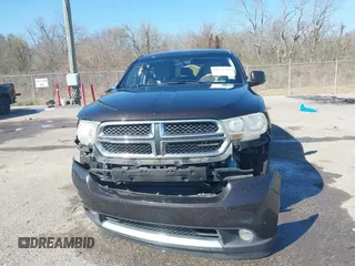 2012 Dodge Durango SXT with VIN 1C4RDHAG0CC196871, listed as a IAAI auction lot 41771399 with 254,779 mi miles and . Bid and sale history available at DreamBid. Image 12.