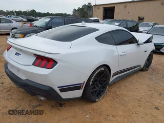 2024 Ford Mustang GT with VIN 1FA6P8CF1R5428590, listed as a IAAI auction lot 41791699 with 9,728 mi miles. Bid and sale history available at carsss.com. Image 4.
