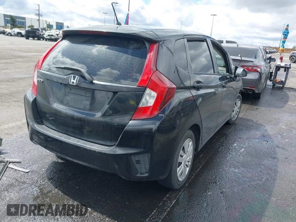 2016 Honda Fit LX with VIN JHMGK5H53GX012374, listed as a IAAI auction lot 41760754 with 146,836 mi miles. Bid and sale history available at carsss.com. Image 4.