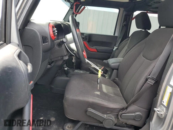 2014 Jeep Wrangler Unlimited Sport with VIN 1C4BJWDG3EL108151, listed as a Copart auction lot 49862315 with 104,417 mi miles and Salvage Title. Bid and sale history available at carsss.com. Image 7.