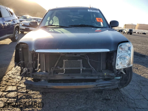 2013 GMC Yukon Denali with VIN 1GKS1EEF0DR205906, listed as a Copart auction lot 87969385 with 128,283 mi miles and Salvage Title. Bid and sale history available at carsss.com. Image 5.