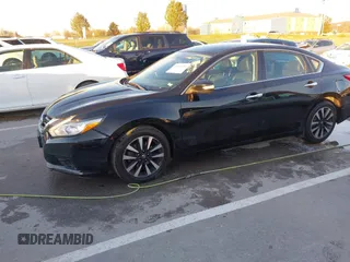 2018 Nissan Altima SR with VIN 1N4AL3AP7JC129741, listed as a IAAI auction lot 40923554 with 161,218 mi miles and . Bid and sale history available at carsss.com. Image 20.