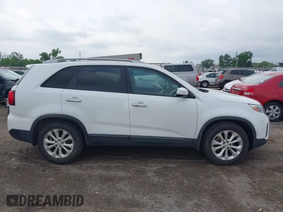 2015 Kia Sorento EX with VIN 5XYKU4A71FG647090, listed as a IAAI auction lot 42100215 with 121,842 mi miles. Bid and sale history available at carsss.com. Image 14.