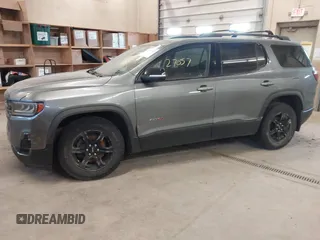 2021 GMC Acadia AT4 with VIN 1GKKNLLS2MZ208492, listed as a IAAI auction lot 42027057 with 87,745 mi miles. Bid and sale history available at carsss.com. Image 2.