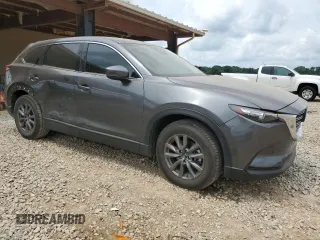 2020 Mazda CX-9 Touring z VIN JM3TCACY3L0411822, wystawiony jako Copart lot #60323295 z przebiegiem 61 348 mil mil oraz Szkoda całkowita • Salvage title. Historia ofert i sprzedaży dostępna na DreamBid. Obrazek 4.