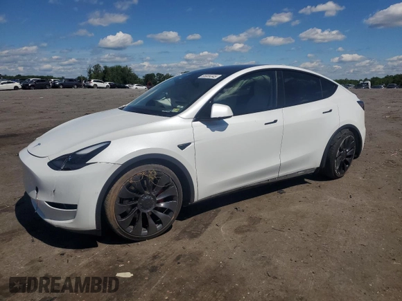 2022 Tesla Model Y Performance with VIN 7SAYGDEF9NF372337, listed as a Copart auction lot 55889345 with 51,099 mi miles and Salvage title. Bid and sale history available at DreamBid. Image 1.