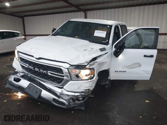 2023 Ram 1500 Big Horn z VIN 1C6RRFFG7PN698664, wystawiony jako IAAI lot #41103495 z przebiegiem 34 307 mil mil oraz . Historia ofert i sprzedaży dostępna na DreamBid. Obrazek 6.