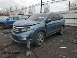 2016 Honda Pilot Touring with VIN 5FNYF6H91GB022219, listed as a Copart auction lot 52796985 with 142,014 mi miles and Salvage Title. Bid and sale history available at carsss.com. Image 1.