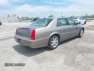 2006 Cadillac DTS 1SD z VIN 1G6KD57Y06U197794, wystawiony jako IAAI lot #42226706 z przebiegiem 135 748 mil mil oraz . Historia ofert i sprzedaży dostępna na DreamBid. Obrazek 4.
