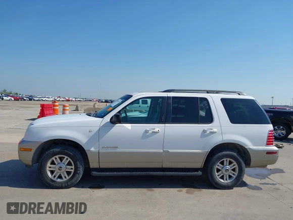 2002 Mercury Mountaineer with VIN 4M2DU86W02UJ21875, listed as a IAAI auction lot 41972193 with 154,699 mi miles and . Bid and sale history available at DreamBid. Image 14.