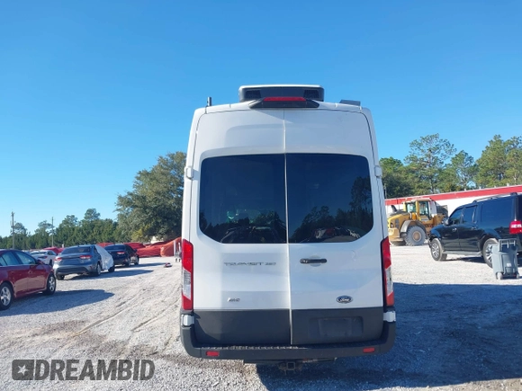 2022 Ford Transit Cargo with VIN 1FTBW3U85NKA01097, listed as a IAAI auction lot 41076643 with 24,786 mi miles and . Bid and sale history available at DreamBid. Image 16.