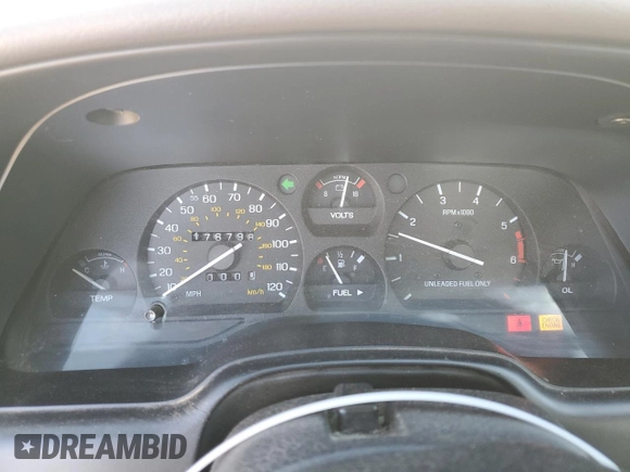 1994 Ford Thunderbird LX with VIN 1FALP62WXRH217279, listed as a Copart auction lot 80512504 with 176,798 mi miles and Salvage Title. Bid and sale history available at DreamBid. Image 9.