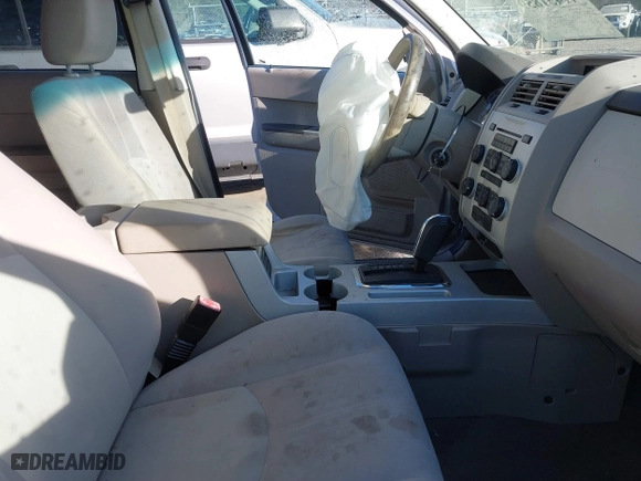 2008 Mercury Mariner with VIN 4M2CU81Z18KJ28741, listed as a IAAI auction lot 41451859 with 199,818 mi miles. Bid and sale history available at carsss.com. Image 5.