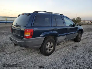 1999 Jeep Grand Cherokee Laredo with VIN 1J4GW58N6XC784679, listed as a Copart auction lot 85345304 with 234,584 mi miles and Salvage Title. Bid and sale history available at carsss.com. Image 3.