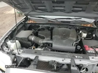 2019 Toyota Tacoma SR z VIN 5TFCZ5AN8KX174922, wystawiony jako Copart lot #69727975 z przebiegiem 60 995 mil mil oraz Szkoda całkowita • Salvage title. Historia ofert i sprzedaży dostępna na DreamBid. Obrazek 14.