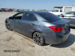 2019 Toyota Corolla L with VIN 5YFBURHE9KP910059, listed as a IAAI auction lot 41856905 with 104,096 mi miles and . Bid and sale history available at DreamBid. Image 3.